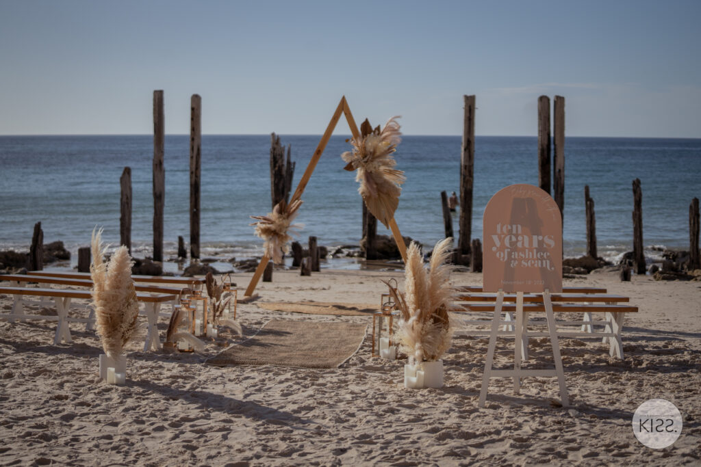 Beach wedding setup beside the old jetty posts at Port Willunga