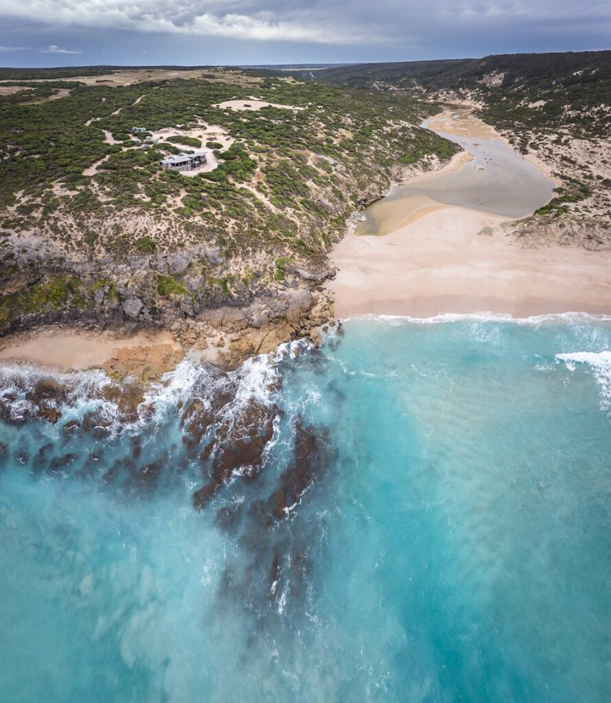 Aerial view of a secluded sandy cove on Kangaroo Island