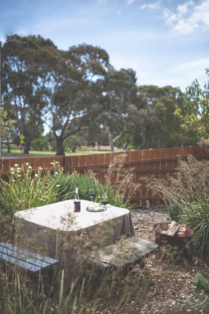 Outdoor bath among garden plants