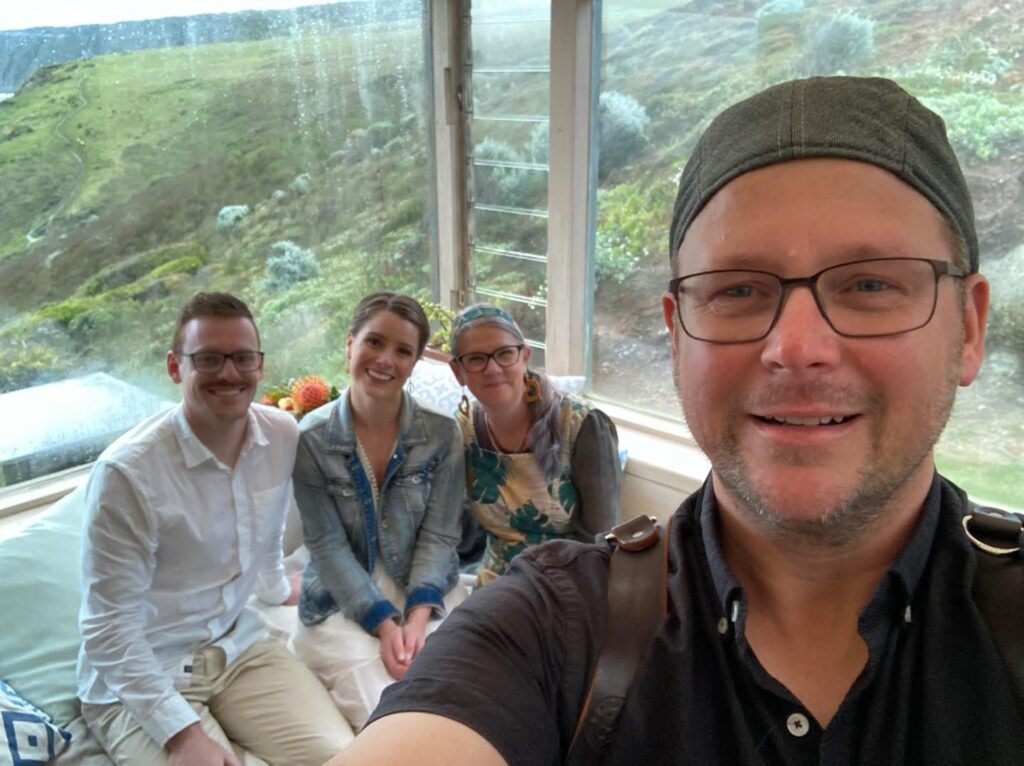 The KISS team with a wedding couple indoors
