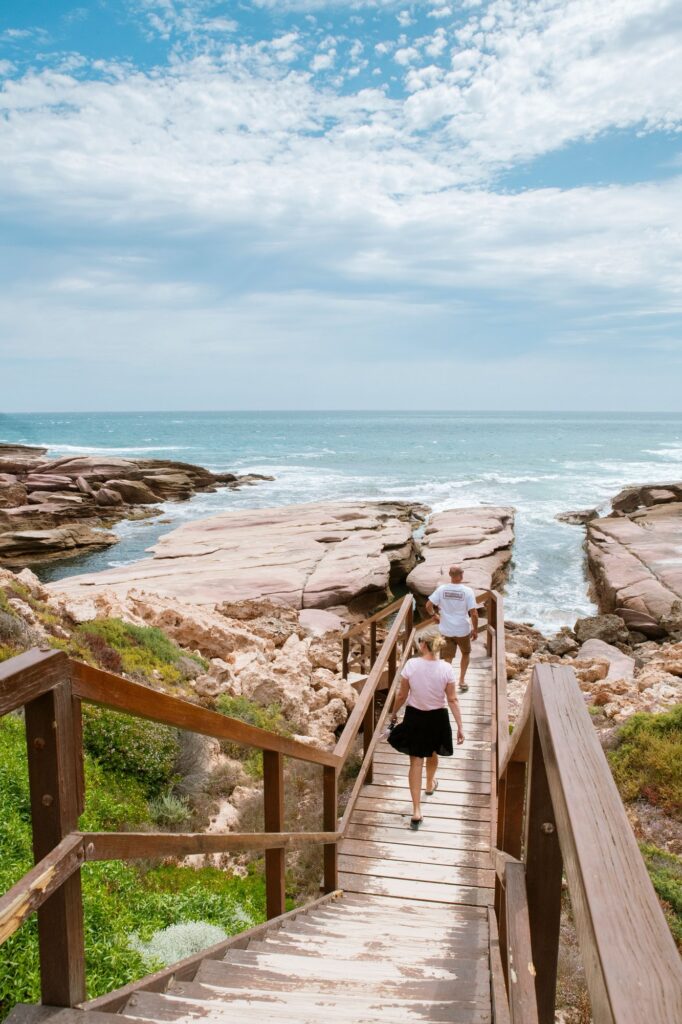 Visitors on the steps leading towards Talia Caves and the coast.