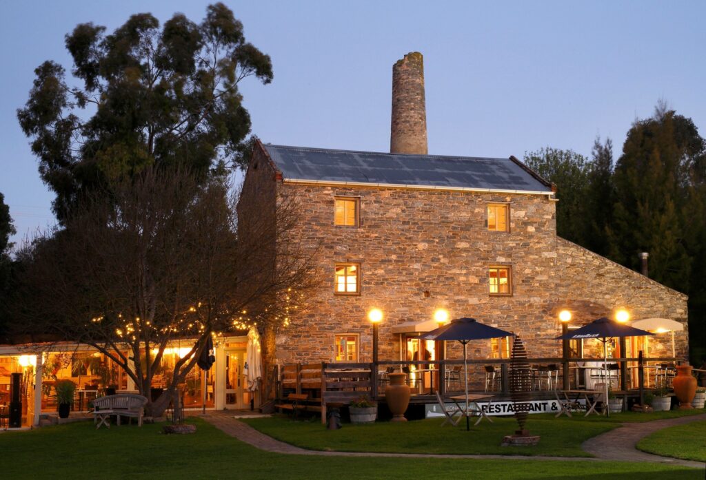 Historic stone building at Leonards Mill, Second Valley, at dusk.