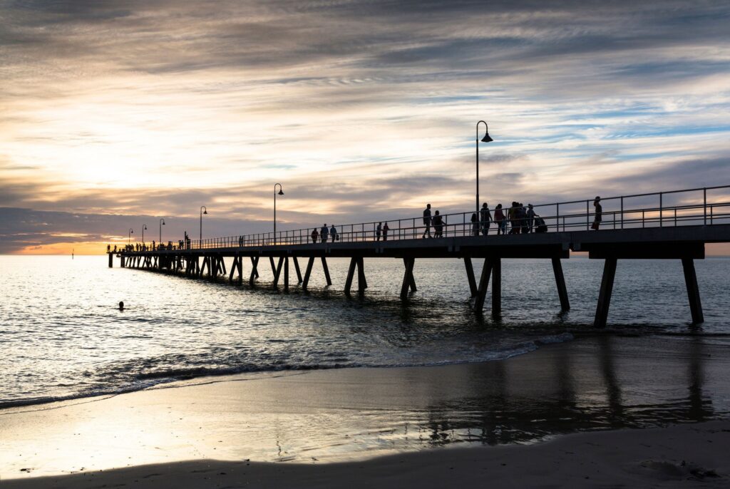 Glenelg jetty and beach at sunset