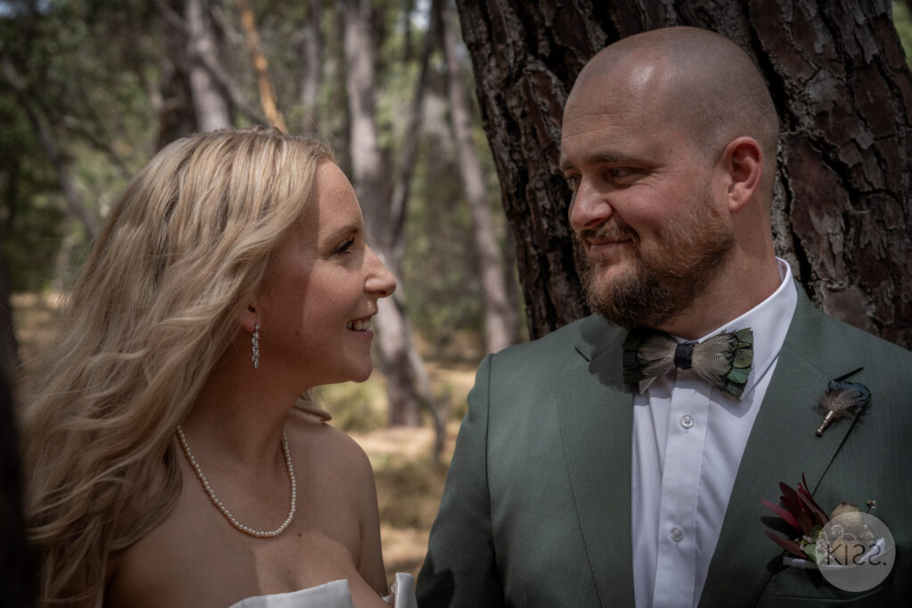 A couple sharing a close moment at Rocky Creek Hut