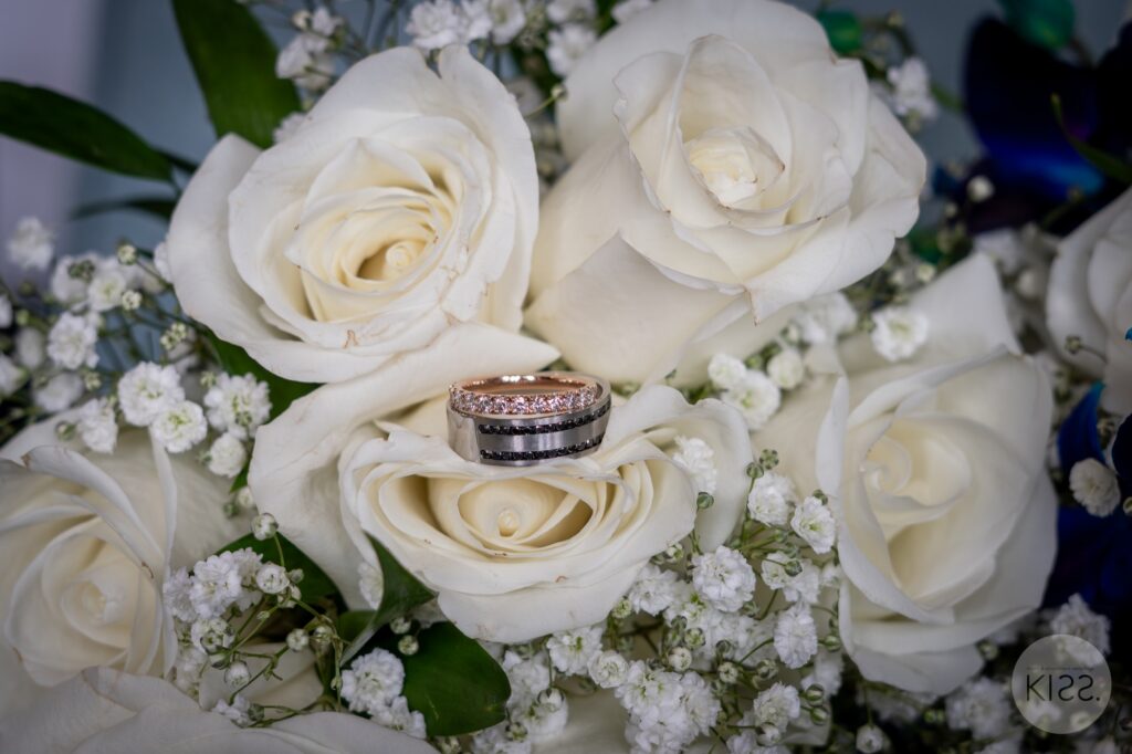A bouquet and wedding rings at a Glenelg wedding
